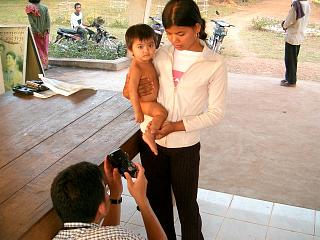 Taking a picture of a baby's leg
